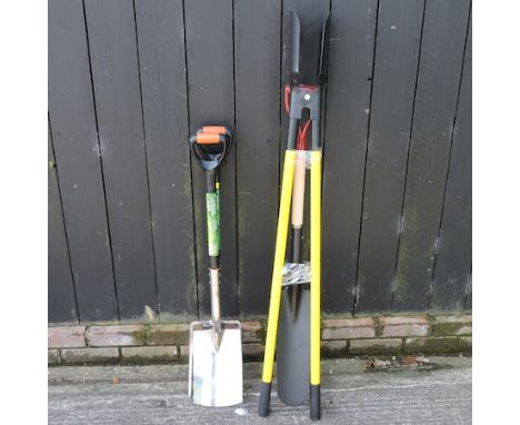 A stainless steel garden fork and spade, together with a posthole digger and a spade 