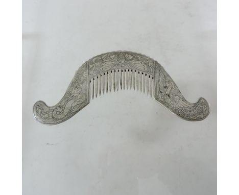 An Eastern white metal hair comb, 15cm