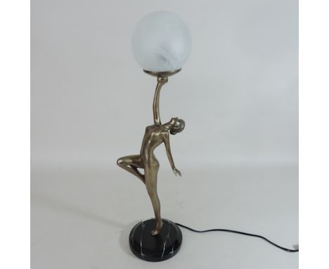 An Art Deco style figural table lamp, with a glass shade, 58cm tall