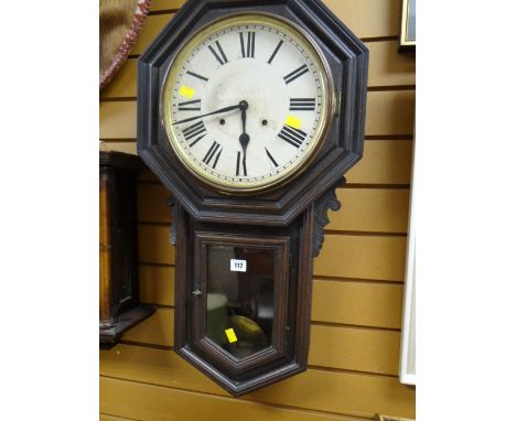 A lustre metal 'knight in armour' fireguard together with an antique American pendulum wall clock
