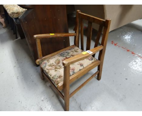 A vintage wooden nursery commode