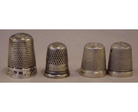 Five assorted sterling silver thimbles with various silver marks (including English hallmarks), one decorated with rose ename