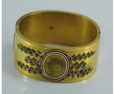 Antique Russian 14ct gold child's bangle glazed portrait cartouche to front, with enamel decoration. Hallmarked on tongue. So