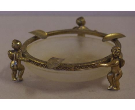 Vintage brass three standing cherub feet ash tray with glass insert, W13.5cm approx
