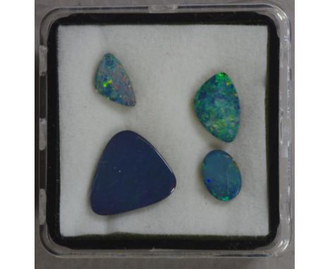 Four Lightning Ridge black opal doublet gemstones 8 carats