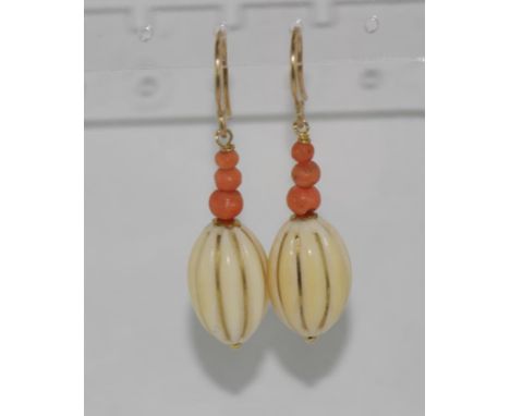 Vintage ivory earrings with pink coral beads and 9ct gold hooks. NB This item may not be exported without CITES documentation