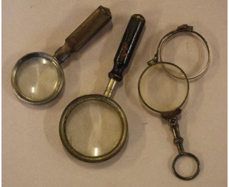 Three various vintage magnifying glasses