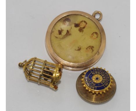 9ct gold Rotary pin - Past Treasurer with brass back, together with a 9ct gold bird cage charm and a 9ct gold locket.