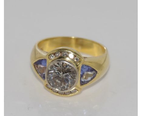 Large Diamond (2ct +) & Tanzanite ring set in 18ct gold, the centre diamond is a brilliant round cut diamond, approx 2.25ct, 