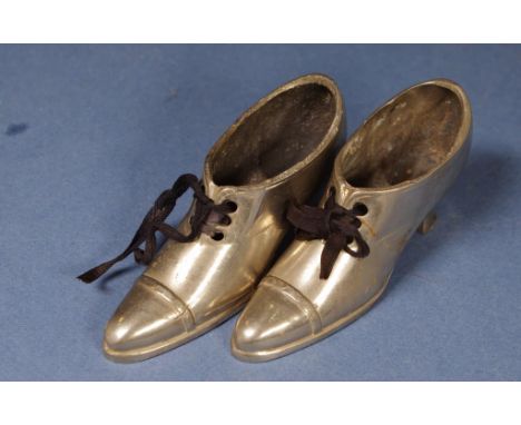 Two vintage shoe pin cushions