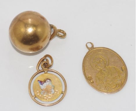 Three Russian 14ct gold pendants to include a St. Christopher, a ball pendant and a enamel pendant (a/f). Total weight 5.5gms