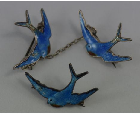 Sterling silver & enamel Bluebird coat clips and a matching brooch. Enamel losses.
