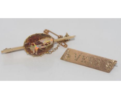 9ct gold and boulder opal bar brooch together with a Russian 9ct gold bar brooch. Total weight 7.8gms