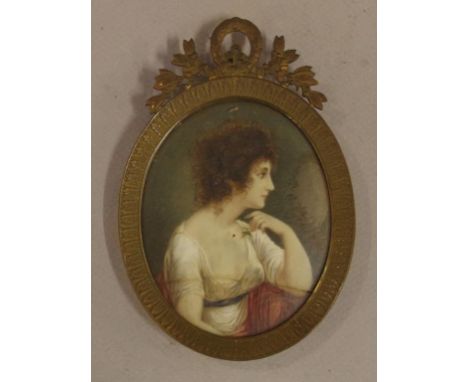 Antique handpainted portrait miniature of a lady in an ornate topped oval frame, H13.5cm X W9cm approx
