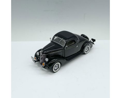 A limited editionÂ&nbsp;Danbury Mint die-cast replicaÂ&nbsp;of the classic 1936 Ford Deluxe Coupe, finished in an elegant bla
