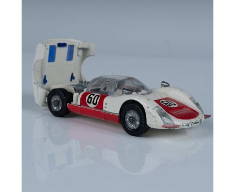 Rare first version Lesney released in 1967. Die cast car has red trim and blue engine canopy which opens to reveal the engine