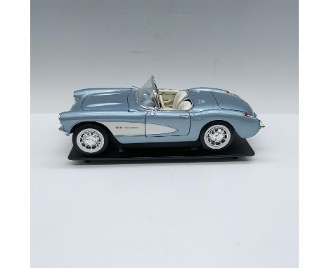 Fuel injected model, convertible in blue with white interior, doors, hood and trunk open. Marked Road Signature. This item ha