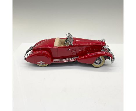 A stunningÂ&nbsp;Danbury Mint die-cast replicaÂ&nbsp;of the 1934 Packard V-12 Convertible Coupe, finished in a striking red w