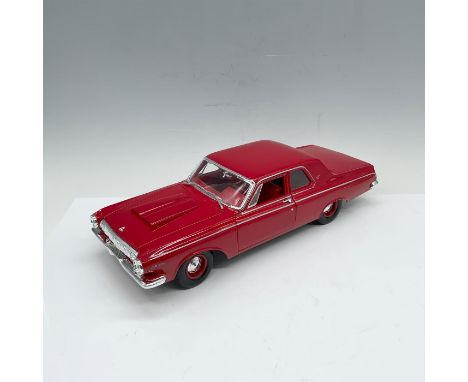 Beautiful die-cast depiction of a classic all red car that is adorned with chrome accents. Driver and passenger doors open as