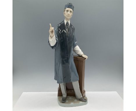 Glossy porcelain depiction of an attorney. Lladro backstamp. Artist: Salvador FurioIssued: 1974 - 1985Dimensions: 6.5''L x 5'