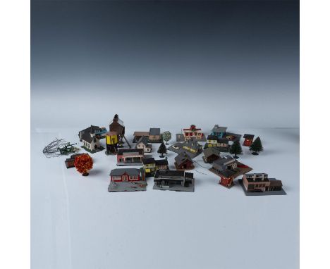 This delightfully charming train set cityscape consists of beautifully detailed constructed and painted houses, shops, mills,