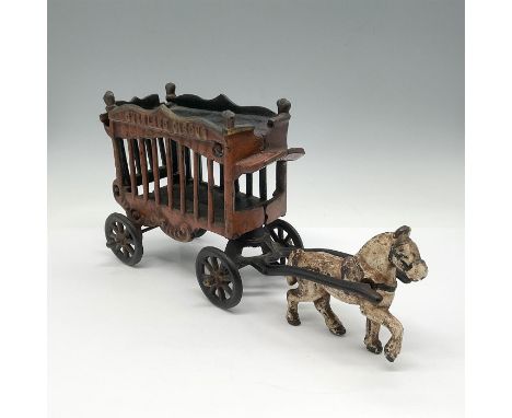 A step back in time looking at this metal toy depicting a part of Circus mobility. Issued: 20th centuryDimensions: 10.75"L x 
