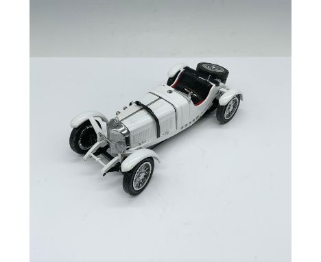 A beautifully detailedÂ&nbsp;Danbury Mint die-cast replicaÂ&nbsp;of the 1931 Mercedes-Benz SSKL, finished in an elegant white