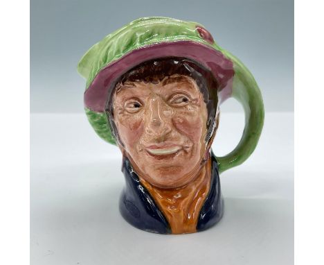 Modeled in blue jacket, lime green feather hat with maroon button. Royal Doulton backstamp. Artist: Harry FentonIssued: 1946D