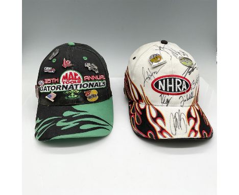 Two ball caps commemorating the 40th Annual NHRA Gatornationals (white with flames) - signed by drivers with accompanying pin