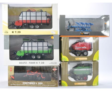 A group of six farm model implement issues from Universal Hobbies. All with minor faults and/or repairs and signs of display 