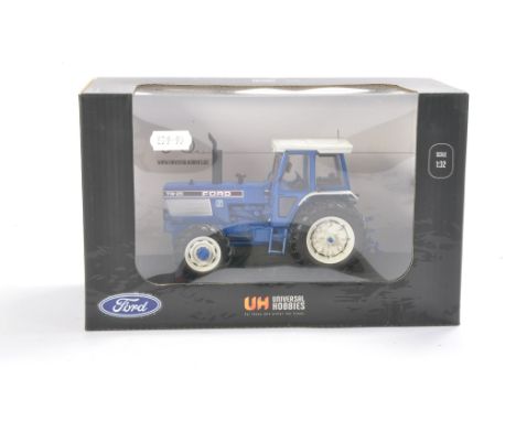 Universal Hobbies 1/32 Farm Model issue comprising Ford TW25 Tractor. Not previously removed from box, hence excellent and as