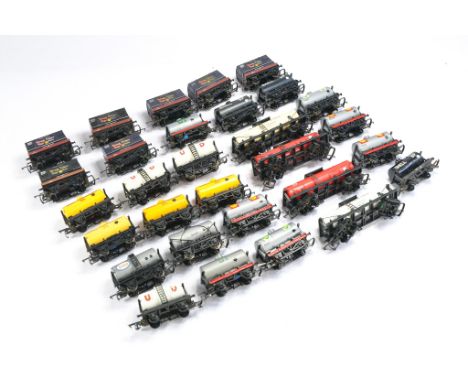 Triang Model Railway issues comprising a group of various rolling stock / wagons / trucks inclusive of mostly tankers plus so