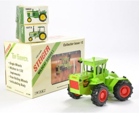 Ertl 1/32 Steiger Wildcat Tractor plus 1/64 John Deere issues as shown. Very good to excellent with boxes. 
