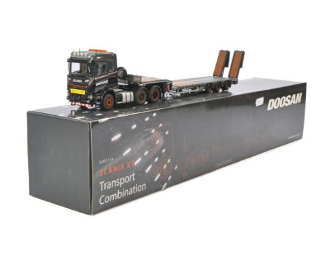 IMC Model Truck issue comprising Scania XT R Series 6X4 Nooteboom Low Loader in livery of Doosan. Not previously removed from
