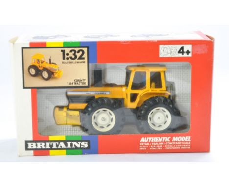 Britains Farm No. 9521 County 1884 Tractor in Yellow. Looks to be excellent and without fault in very good to excellent box. 