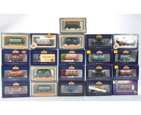 A group of 15 Bachmann and 6 Dapol Model Railway Wagons comprising 8 Plank end Door Wagon, 7 Plank Wagon with Coke rail 'Stri