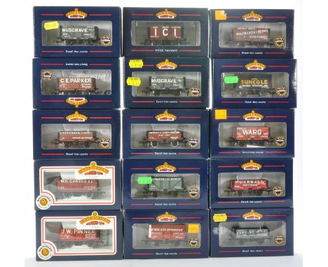 A group of 15 Bachmann Model Railway Wagons comprising 5 Plank Wagon Steel Floor Tarslag', 5 Plank Wagon 'Hucknall', 8 Plank 