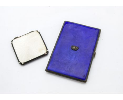 An Art Deco silver and enamelled cigarette case and compact, the rectangular cigarette case with blue enamel and Royal Navy c