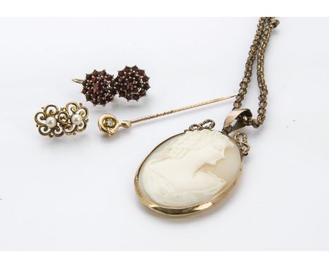 A group of Victorian and later jewellery, including a cameo locket on pinchbeck chain, a pair of 9ct gold earrings, a 9ct gol