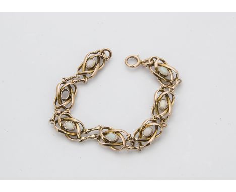 An Edwardian 9ct gold and opal bracelet, the twisted links set with an oval opal, unfortunately one stone missing, 15.4g 