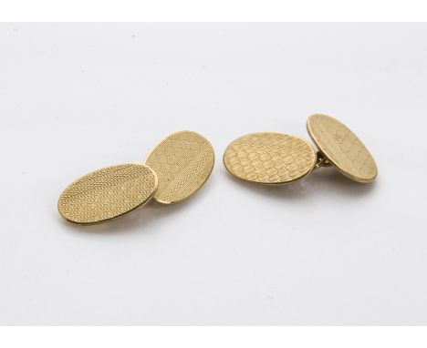 A pair of 1940s 9ct gold cufflinks, engine turned oval panels with chain links, hallmarked London 1945, 9.4g (2) 