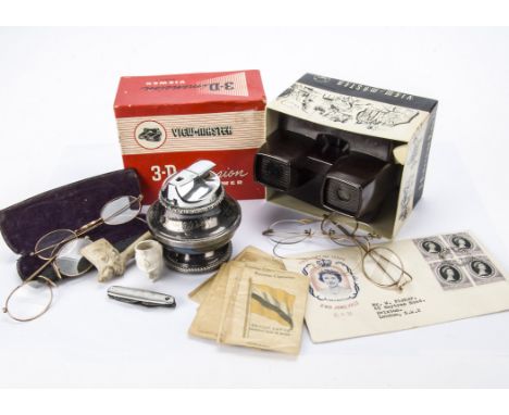 Four pairs of antique and vintage spectacles, together with two clay pipes, a View Master 3D viewer, a table lighter, a part 