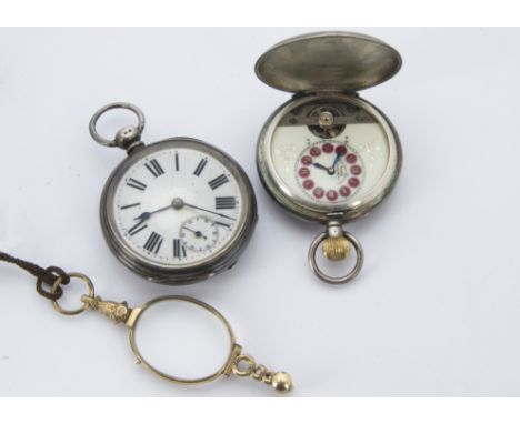 A Victorian silver open faced pocket watch, together with an interesting keyless continental silver full hunter pocket watch,