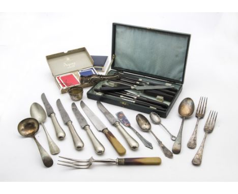 A small quantity of silver plated flatware, together with an Asprey set of playing cards and another (parcel) 