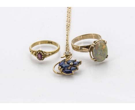 A 9ct gold and gem set pendant on chain, together with a gold and opal ring and an 18ct gold and gem set ring (3)