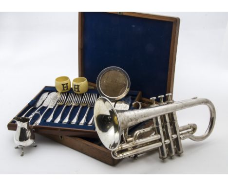 A collection of silver and silver plated items, including a late Victorian silver cream jug, eight silver teaspoons, two must