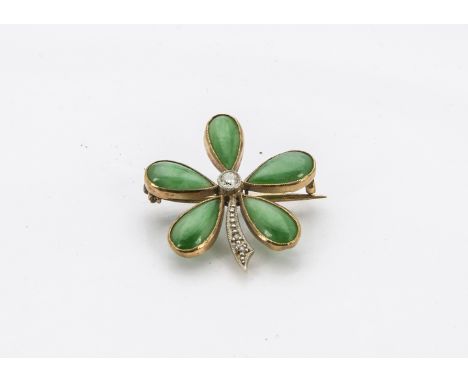 A pretty vintage jade and diamond brooch, in the form of a flower with green hardstone petals and diamond to centre and stem,