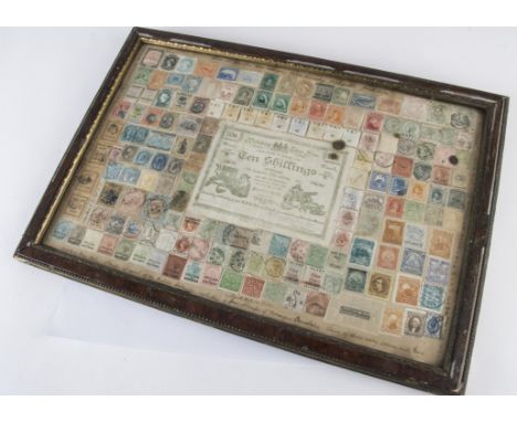 A Victorian and later framed stamp and bank note montage, centred with a March 1900 Mafeking Siege Note Ten Shilling, No. 523