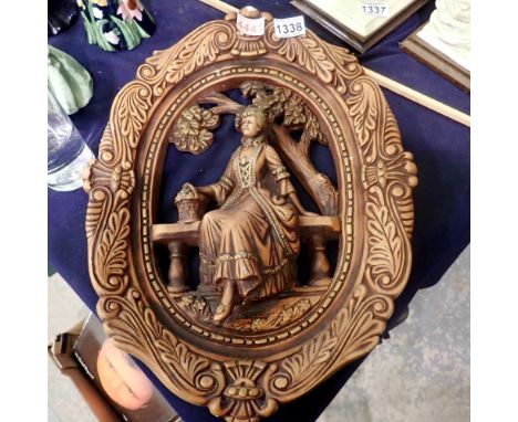 Wall hanging plaster moulding of a lady sitting on a bench, H: 44cm. UK P&amp;P Group 3 (£30+VAT for the first lot and £8+VAT