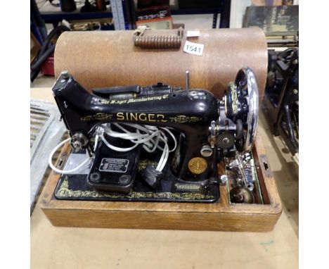Singer cased sewing machine with pedal and accessories. Not available for in-house P&amp;P 